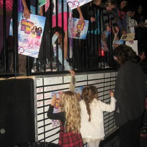 Nov. 2010, Emily and Caitlin signing autographs on the set of Disney's Shake It Up!