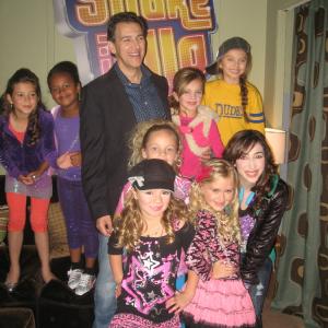 Nov 2010 Emily and Caitlin with Ainsley Bailey John D Aquino and Little Cutie Queens on set of Disneys Shake It Up!