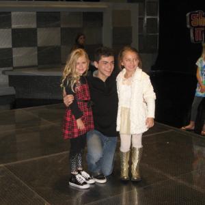 Nov 2010 Emily and Caitlin with Adam Irigoyen on the set of Disneys Shake It Up! Emilys sister Lauren smiling and looking on