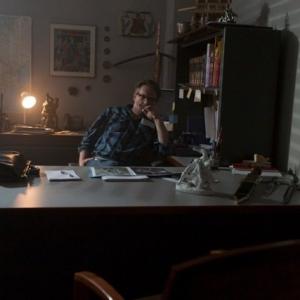 Director Miles Doleac thinks through a scene in Hadleys office