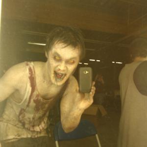 Photo of Andy Yu as Lead Undead Chaser in Universal Orlando commercial MakeUp Arstist Conor McCullagh FaceOff Season 1 winner