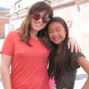 Victoria Grace with Kelly Clarkson on set making the Dark Side music video