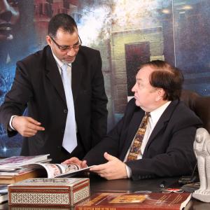 David H Swingler in his Caro offices in 2013  with Adel Sayed Metwally discussing Swinglers Egypt theme parks