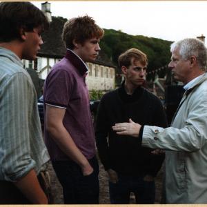 Jeremy Irvine, Matt Milne, Robert Emms and Richard Curtis on set of War Horse
