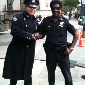 John Mancini as an NYPD Police Officer on the set of Blood Ties