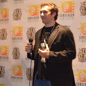 Matthew Ziff receiving the Up and Coming Actor Award at the 2013 Sunscreen Film Festival