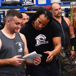 Matthew Ziff and TJ Storm going over the script for The Martial Arts Kid