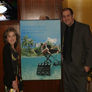 Jessica Kelly (left) and Lawrence R. Greenberg and the Honolulu International Film Awards where Zombie Love Potion won a Gold Kahuna Award