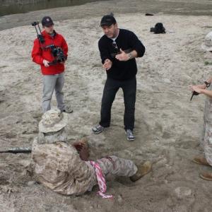 Peter J. Eaton directing soldiers for Afghanistan combat scene in in 