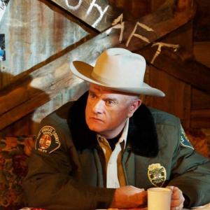 Bobby Reed as the Sheriff in The Passenger