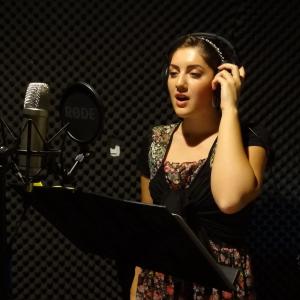 Composer/Vocalist, Mary Rose Maher, recording in Four1One Studios.