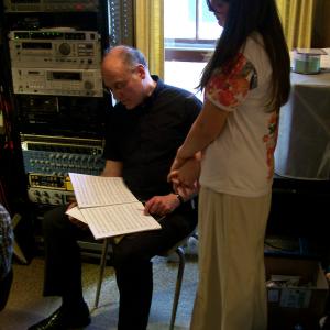 Mary Rose Maher in grammy award winner, Ed Wolfrum's recording studios with composer Eduard Perrone going over musical numbers.