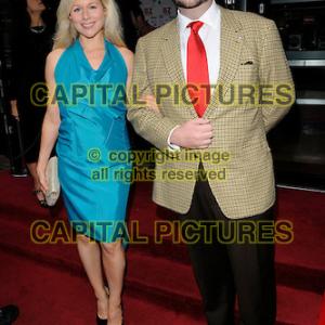 Jonathan Sothcott and Abi Titmuss on the red carpet at the gala screening of Devil's Playground in London