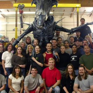 Lon Muckey front row center in red shirt with the Queen alien from AVP