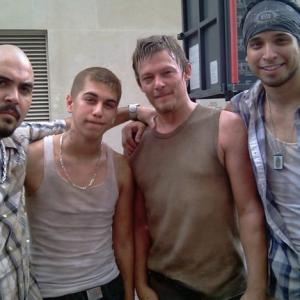 Anthony Guajardo on the set of The Walking Dead with Noel Gugliemi and Norman Reedus.