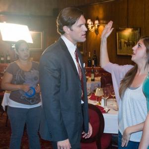Rachel Verret gives direction on how to slap for a scene in 
