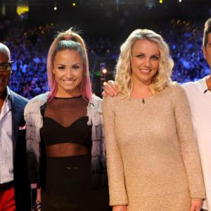 Still of Britney Spears, Simon Cowell, L.A. Reid and Demi Lovato in The X Factor (2011)