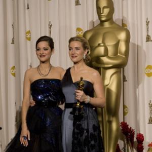 Academy Award®-winner Kate Winslet (right) with presenter Marion Cotillard backstage at the 81st Academy Awards® are presented live on the ABC Television network from The Kodak Theatre in Hollywood, CA, Sunday, February 22, 2009.