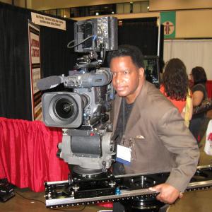 Kirby Britten sets up a test shot with the new Panavision Super HD Camera at the 2010 ShowBiz Expo