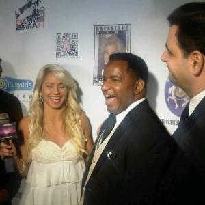 The guys share a funny moment with Lisa on the red carpet at the 83rd Annual PreOscar Bash
