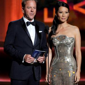 Kiefer Sutherland and Lucy Liu at event of The 64th Primetime Emmy Awards 2012