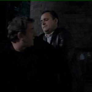 Rebus with Ken Stott. In this still: a Special Branch undercover officer (Goodall), arrests Rebus (Stott)