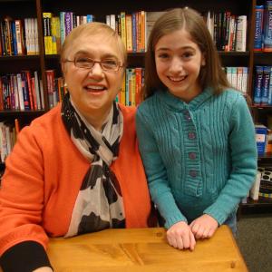 Brigid with Chef Lidia Bastianich. Brigid plays the voice of Lidia's youngest granddaughter in the PBS animated special Nonna Tell Me a Story: Lidia's Christmas Kitchen.