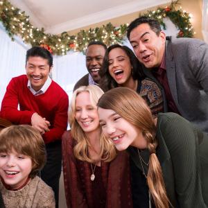 Griffin Kane with Anne Heche Alissa Skovbye Brian Tee Kevin Daniels Kiara Madiera and Carlos Gomez on the set of One Christmas Eve 2014