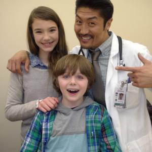 Griffin Kane with Alissa Skovbye and Brian Tee behind-the-scenes of One Christmas Eve, 2014.