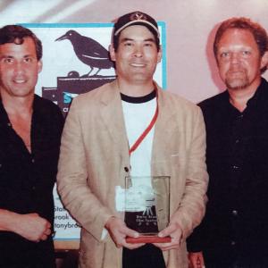 Chris Tashima accepts Best Short Film Award at the 9th Stony Brook Film Festival for Day of Independence  with festival director Alan Inkles and film critic John Anderson  July 2004