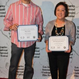 Chris Tashima accepts Best Actor Award and executive producer Carole Fujita accepts Best Narrative Short Award for Lil Tokyo Reporter at the Los Angeles International Underground Film Festival  June 23 2013 Whitefire Theatre Sherman Oaks CA