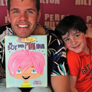 Jayden with Perez Hilton, during an interview about Perez's new children's book.