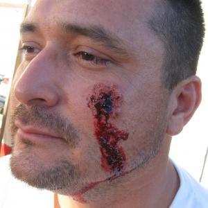 SFX: Bullet wound & blood