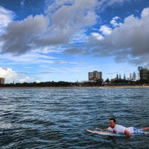 Nick Cooper out at sea of Mooloolaba beach during the shooting of Just Like U
