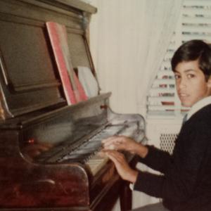 Rafael Torres  young at piano