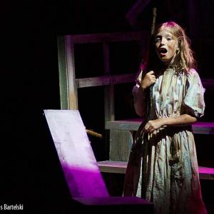 Christa Beth Campbell as Young Cosette in Les Miserables.
