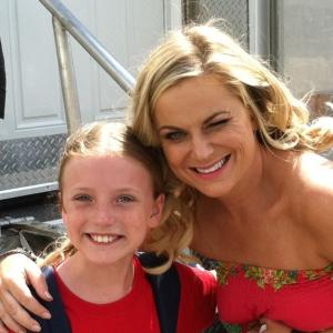 Christa Beth Campbell with Amy Poehler on the set of Sisters She plays the younger version of Amy in the movie