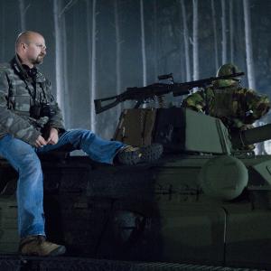Neil Marshall relaxing between takes on DOOMSDAY