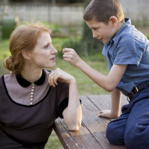 Still of Jessica Chastain and Tye Sheridan in The Tree of Life 2011