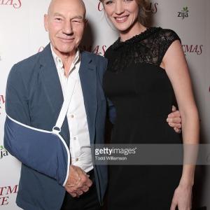 Patrick Stewart and Jaclyn Hales posing on red carpet for world premier of 
