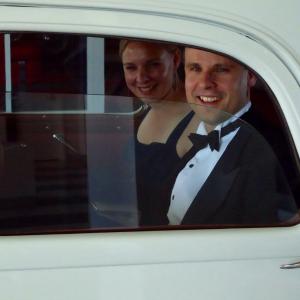 Producer Lincoln Fenner and his wife Natasha Fenner arriving by vintage car to the Red Carpet Opening Gala of the BOFA Film Festival.