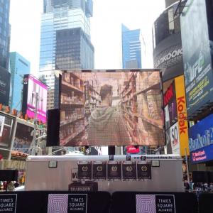 Lincoln Fenner (Director/ Producer/ Presenter) on screen in MORE 4 ME as it screens in New York's Times Square