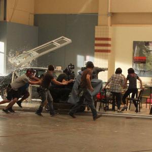 Teddy Smith center on the dolly operates a crash sequence on Left Behind