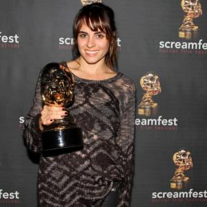 Ashley C. Williams wins Best Actress award for her role as Julia in the revenge thriller Julia at the 2014 ScreamFest LA awards ceremony.