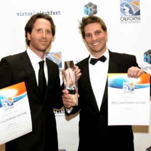Johnny Scalco (left) and Doug Maguire (right) hold their award and certificates for Best California Feature at the California Film Awards where their independent movie 