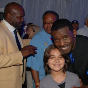 Armaan with Michael Irvin and Emmitt Smith at the NFL Hall of Fame
