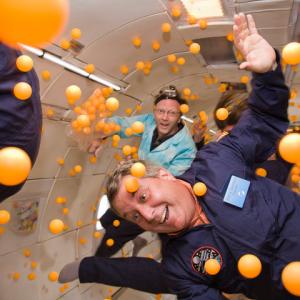 Science Bob on a Zero Gravity flight after releasing 2000 ping pong balls to stidy how they move in zero Gs