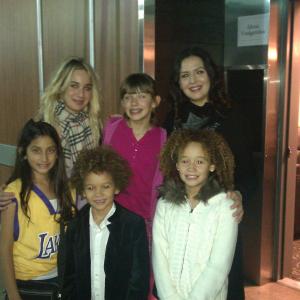 Armani backstage with his sister Talia and other performers at the Andrea Bocelli concert at the LA Staple Center