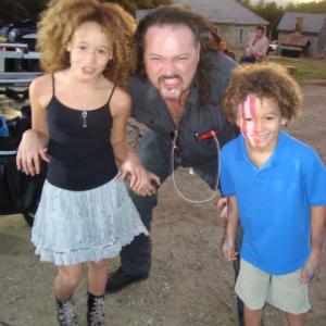 Armani and sister Talia on his music video shoot with country singer Trace Adkins