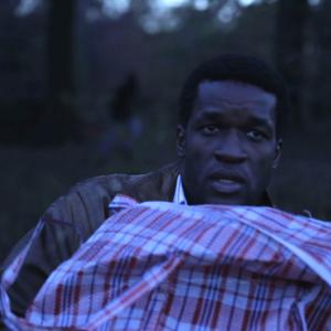 Gilbert Owuor as Kevin in 